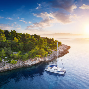 Yacht in amazing bay of pure Greece Sea