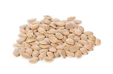 Pumpkin seeds on the white background