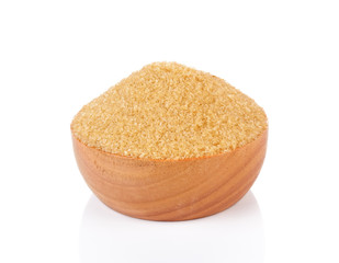 Sugar in a wooden bowl on white background
