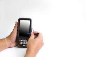 Male hands using a hand held barcode scanner Enterprise Digital Assistant computer.