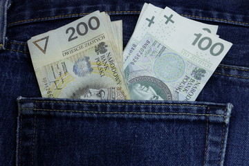polish money in the jeans pocket