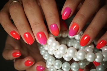 Beautiful bright natural nails with perfect clean manicure. Nail drill machine and cuticle nipper are used simultaneously to make such a clean manicure.