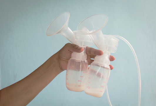 Mom hold Breast Pump