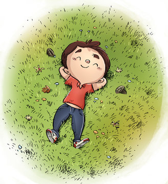 ni&ntilde;o tumbado en el cesped