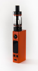 Orange E-cigarette or vaping device. Close up.