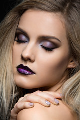 Beautiful girl with dark purple lips