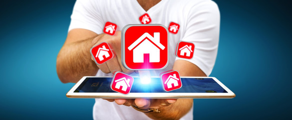 Businessman using modern mobile phone to rent a flat