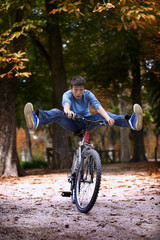 Teenager cycling in a park