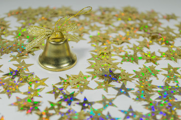 GOLDEN BELL ON STAR BACKGROUND