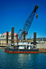 Obraz premium Cargo cranes with platform sea industrial port of Genova, Italy