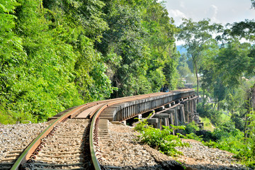Fototapeta na wymiar Beautiful landscape Death Railway bridge over the Kwai Noi River at Krasae cave in Kanchanaburi province Thailand.