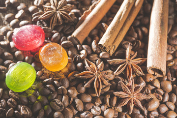 Anise stars , coffee beans, cinnamon sticks and colorful candies