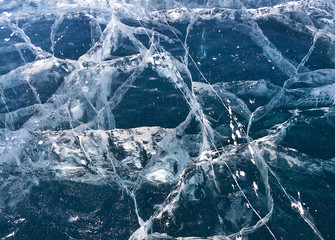 Texture of icy surface of baikal lake in winter