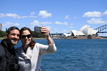 Tourist couple taking a selfie in Sydney