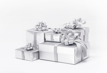 Celebration silver gift boxes on white background