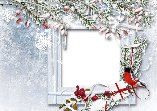 Christmas background with photo frame, bullfinch, snow branches