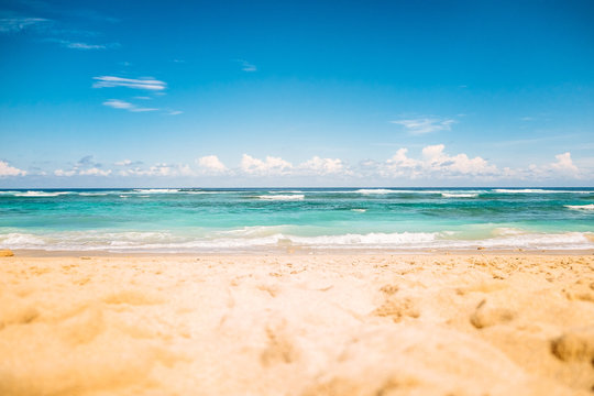 Blur Photography Of White Sand Beach Near Blue Sea At Sunny Day With Clear Blue Sky, Tilt Shift Effect