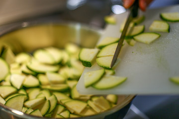cutting and cooking zucchini