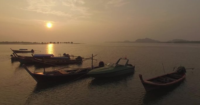 aerial shot fly over fishing boat at bang ben ranong thailand