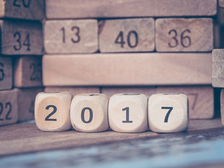 Number 2017 with new year on Toy number blocks /Color filter and Selective focus