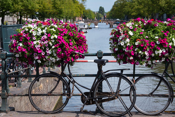 Traditional Dutch bike parked on an Amsterdam canal