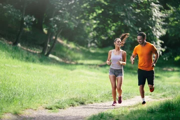 Papier Peint photo Lavable Jogging Couple jogging en plein air