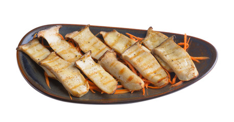 .grilled Eringi mushrooms in plate on white background