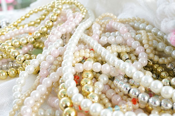 Pearl necklaces, lady accessories for sale.