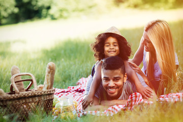 Happy family enjoying picnic