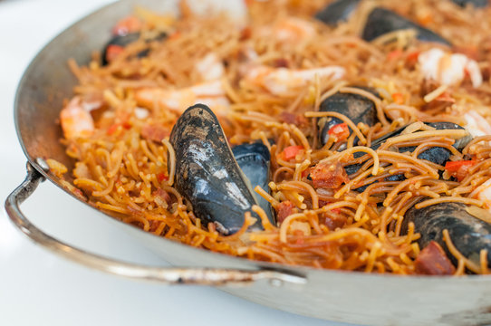 Fideua traditional spanish seafood dish