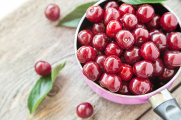 ripe cherries in a pan