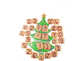 advent calendar cookies around the christmas tree