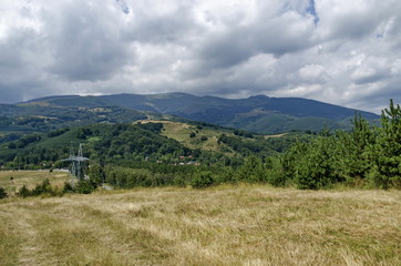 Fototapeta na wymiar Electric power transmission line of advance summer, Plana mountain, Bulgaria