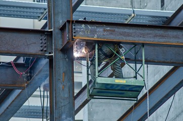 construction worker working on highrise building