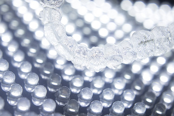 Invisible teeth aligners