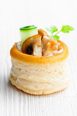 vol-au-vents  puff pastry cases filled with mushrooms and chicke