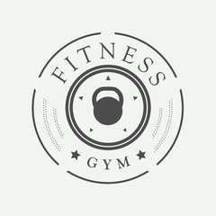 Gym logos, labels and slogans in vintage style. Vector illustration. Fitness logo.