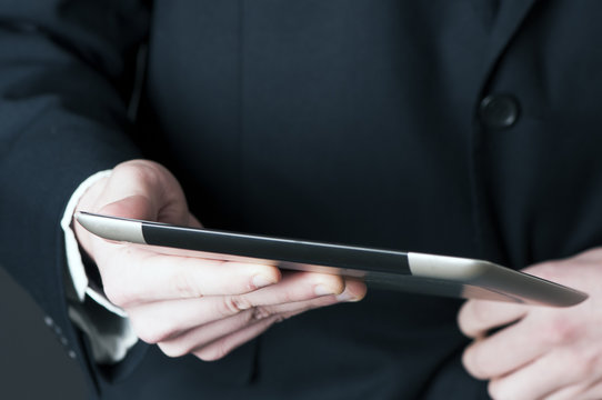 Man holding digital tablet