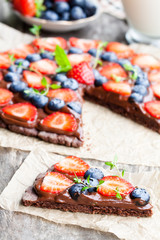 Homemade  chocolate natural fruit pizza with berries