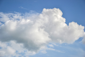 Naklejka na ściany i meble Blue sky with clouds on sunny day background