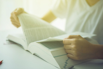 woman's hand read a book