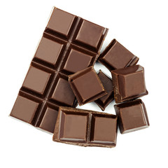 Dark chocolate bar and cubes isolated on white backgroun, top view.