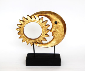 sun and moon together, golden statue on white background
