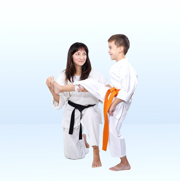 In karategi son beats kicking his mother straightens