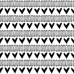 Seamless vector pattern. Black and white geometrical background with hand drawn little decorative elements, hearts, lines. Print with ethnic, folk, traditional motifs. Graphic vector illustration.
