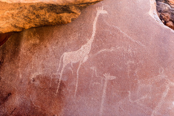The famous prehistoric rock engravings at Twyfelfontein, tourist attraction and travel destination...