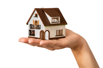 house held in hand, white background
