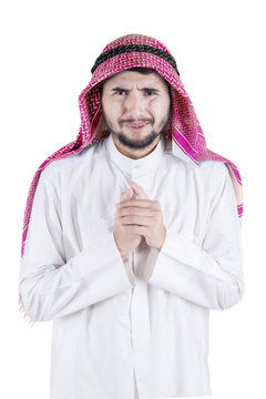 Arabian businessman looks worried