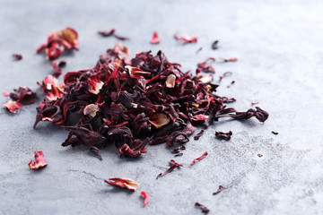 Heap of dry tea on grey table