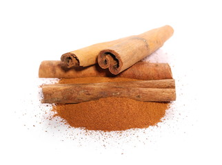Cinnamon sticks and powder isolated on white background